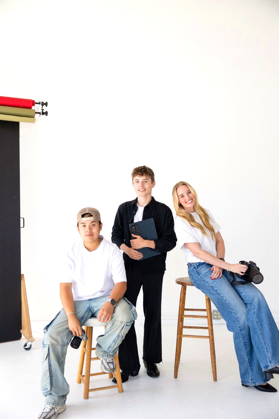 The Savor Social Studio team — Andrew, Taylor, and Hannah — in the studio